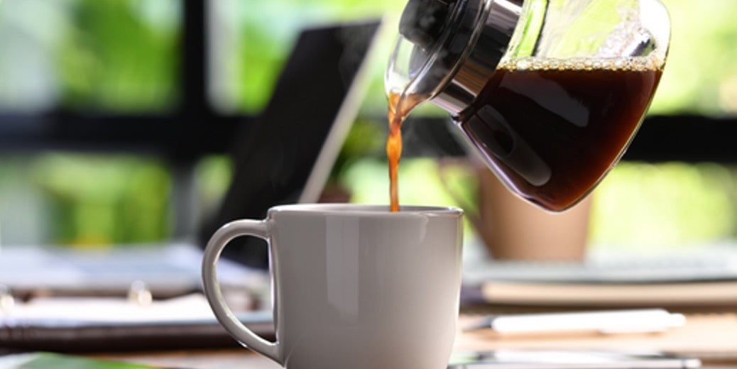 Fabulous Bean Coffee featuring image of coffee being poured from a carafe into a mug.