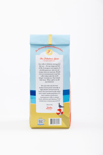 Specialty-grade medium-dark espresso roast ground coffee blend from Colombia and Brazil in a colorful 12 ounce bag with the back panel offering a light-hearted, yet positive, statement on the importance of coffee to our lives while also describing the high quality of this delicious specialty grade coffee.