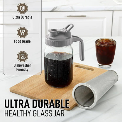 Zulay Cold Brew Coffee Maker displayed on a wooden cutting board on a kitchen counter and featuring an ultra-durable healthy glass jar and stainless steel filter.
