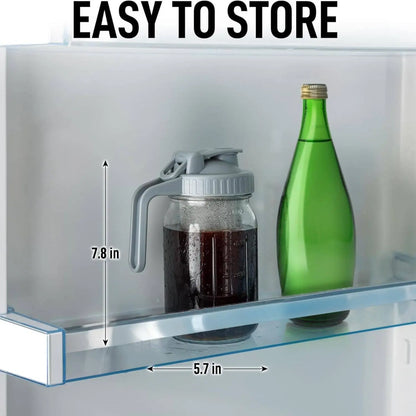 Cold Brew Coffee Maker 32 oz by Zulay depicted in refrigerator door to demonstrate how easily it stores.  