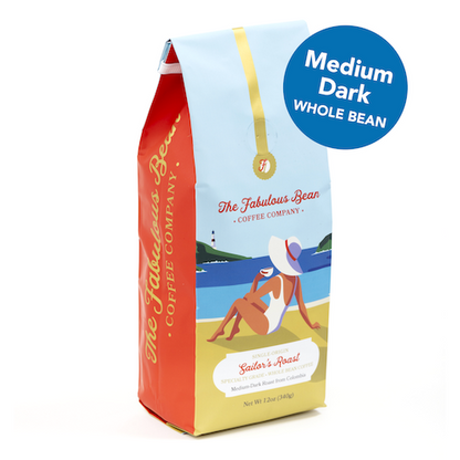 Fabulous Bean Coffee's Sailor's Medium-Dark Whole Bean Roast in a 12 ounce bag featuring a sophisticated woman enjoying coffee on a beautiful beach